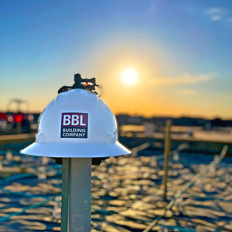 Safety - BBL Safety Helmet with sunset in the background