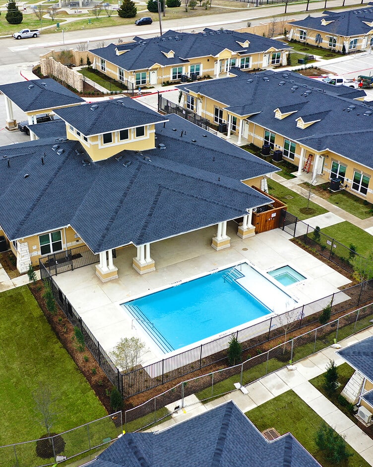 a pool outside a multifamily community administrative office
